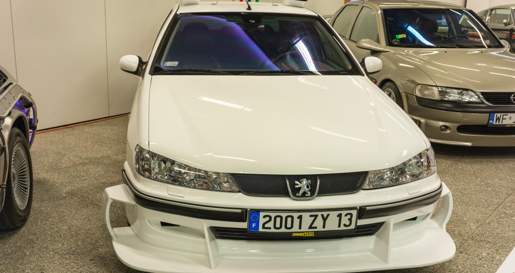 POLAND, Warsaw - December 15, 2024: Peugeot 406 "TAXI", Country of origin: France, Engine: 3.0 V6, Power: 207 HP, Maximum speed: 232 km h, Year of production: 2000.