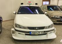 POLAND, Warsaw - December 15, 2024: Peugeot 406 "TAXI", Country of origin: France, Engine: 3.0 V6, Power: 207 HP, Maximum speed: 232 km h, Year of production: 2000.